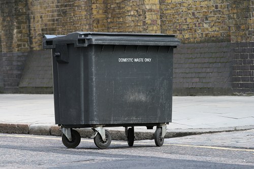 Street crews setting up recycling bins in Soho