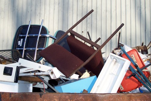 Audit team reviewing supplier documents at a waste facility