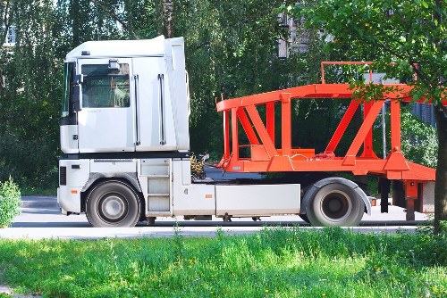 Crew loading a box vehicle with office clearance waste in an inner-city location