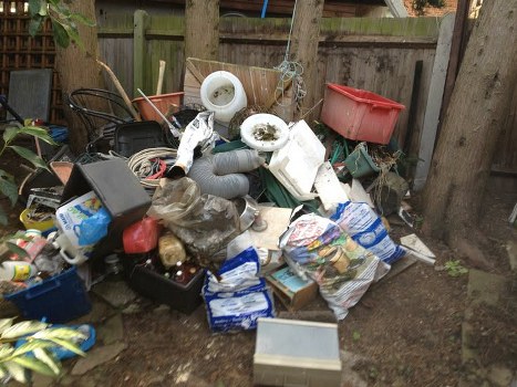 Professional garage clearance team in action